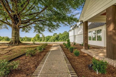 View of yard with a garage