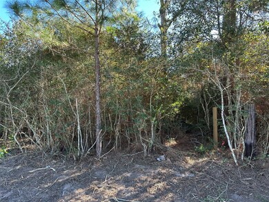 Survey stakes at each corner of the lot