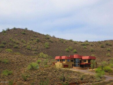 House with mountain behind