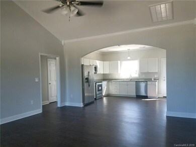 Living room looking into kitchen