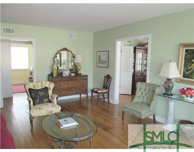 Living Room. Nice hardwood floors throughout
