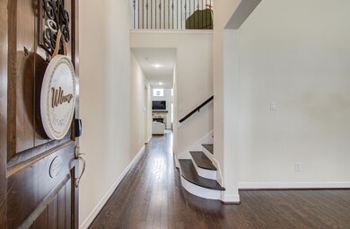 Step into the foyer to find Hardwood floors throug