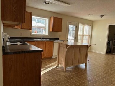 2nd Bedroom featuring dark carpet