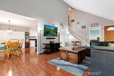 Living room looking into dining area.