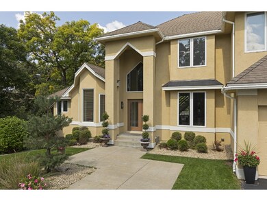 The stucco finish on the front of the home has bee