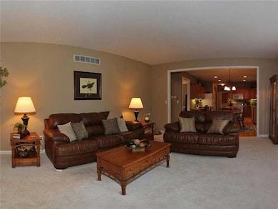 Family Room. Yes!  A family room that is actually large enough for a family!  Enjoy making happy memories as you sit by the fire.