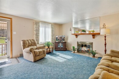 Another view of the sun-drenched living room at 10