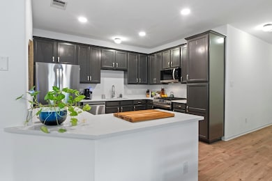 New quartz counters, backsplash and sink