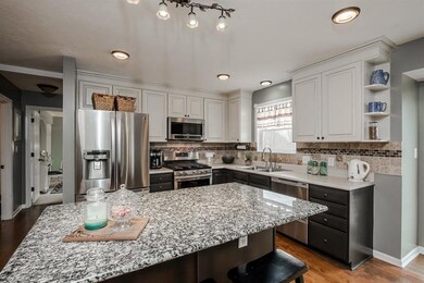 The beautiful large granite center island and the 
