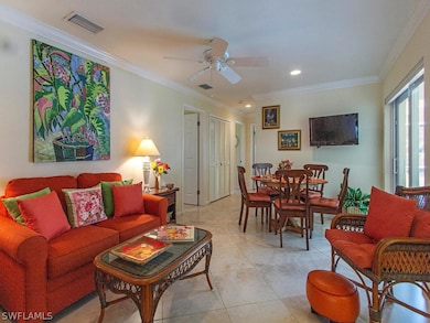 The informal family room off the kitchen has casua
