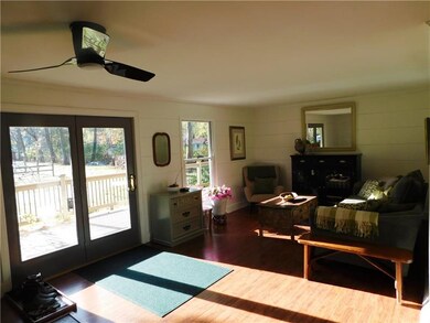 Lots of windows overlooking the tranquil setting i
