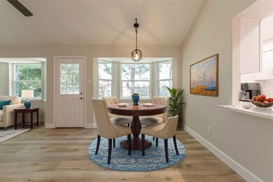 Open concept dining area. Room is virtually staged