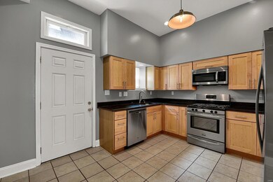 Newer kitchen with Merillat maple soft-close cabin