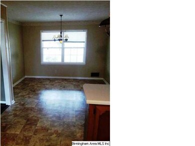 View of kitchen from dining area