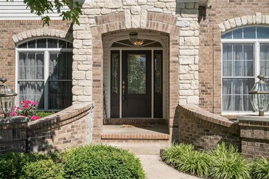 Beautiful brick and stone exterior greet you at th