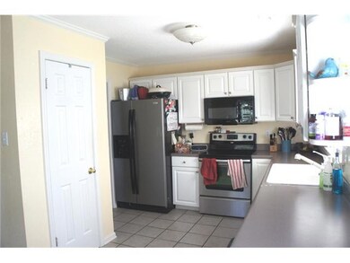 Wonderful eat-in kitchen comes complete with tile 