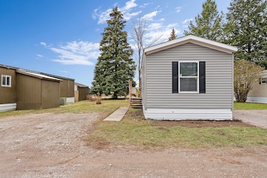 Front view in a friendly, quiet community near Lake Blaine and the Swan Mountain Range