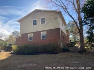 Brick/Vinyl Home Rear