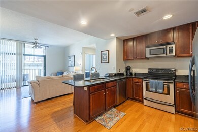 Kitchen featuring appliances with stainless steel