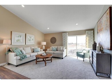 The main level family room will hold most any furn