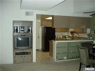 Entertainment Center with view of Kitchen