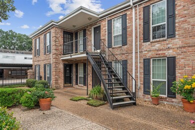 Stairwell leads to this second floor unit