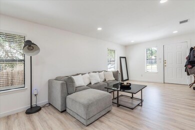 Living area featuring recessed lighting, light wo