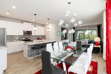 White cabinets and plenty of counter space for dining and entertaining