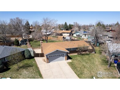 The driveway passes through double gates into the back yard which is great for parking your toys