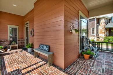 14406 Bergenia Dr - Great front porch for watching the kids play!