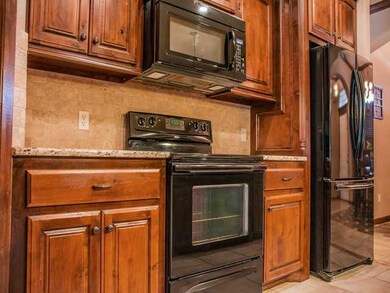 Kitchen. Lots of cabinets & counter space in this 