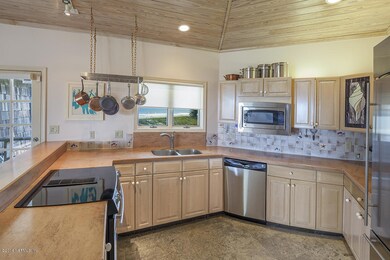 Kitchen has solid surface counters
