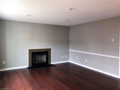 Wood-burning fireplace in large living room