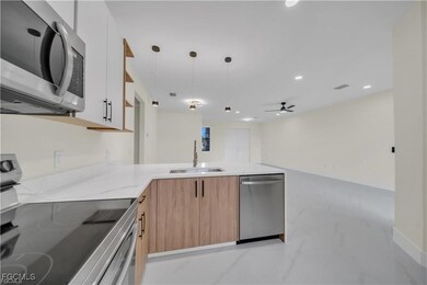 3718 20th St SW, Lehigh Acres, FL 33976 - photo 4