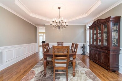 A gorgeous chandelier is the centerpiece for the f