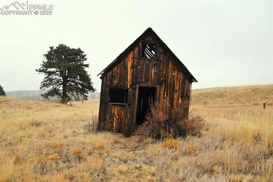 View of barn with a rural view