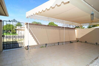 Concho front patio w/awning.