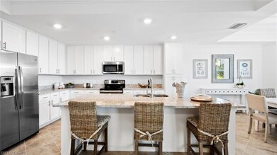 Kitchen with sink, stainless steel appliances, a k