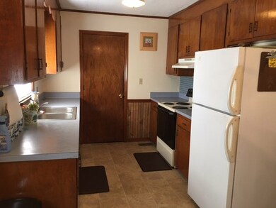 Kitchen (laundry room behind door)