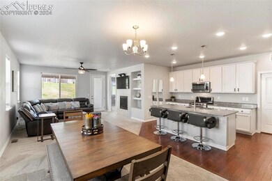 Dining area featuring dark hardwood / wood-style f