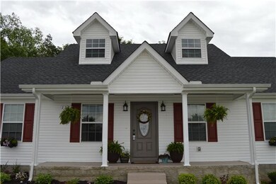 Charming covered front porch.