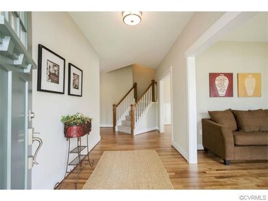 Foyer with Hickory Floors & Craftsman-Style Rails 