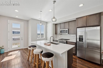 Stunning kitchen featuring open floor plan, stainl