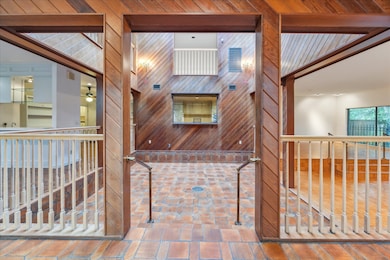 At the entrance is a light filled double height at