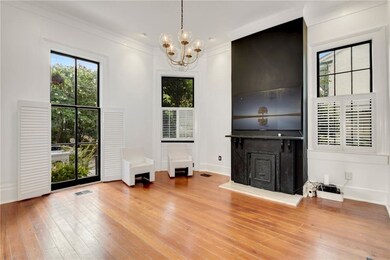 Chic and elegant living room--Large-Screen TV abov