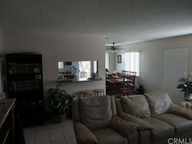 living room looking in to kitchen