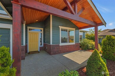 Large covered entry / sitting porch.