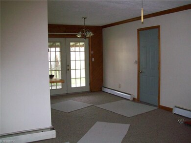 Dining room with the French doors. Door to the rig