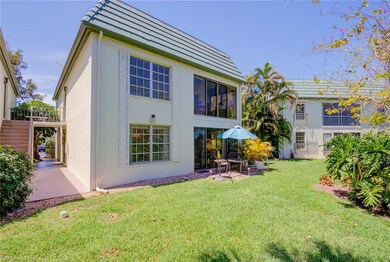 Backyard view of windows and lanai
