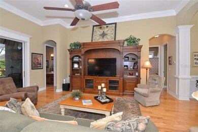 Family room with views of pool. Check out the cust